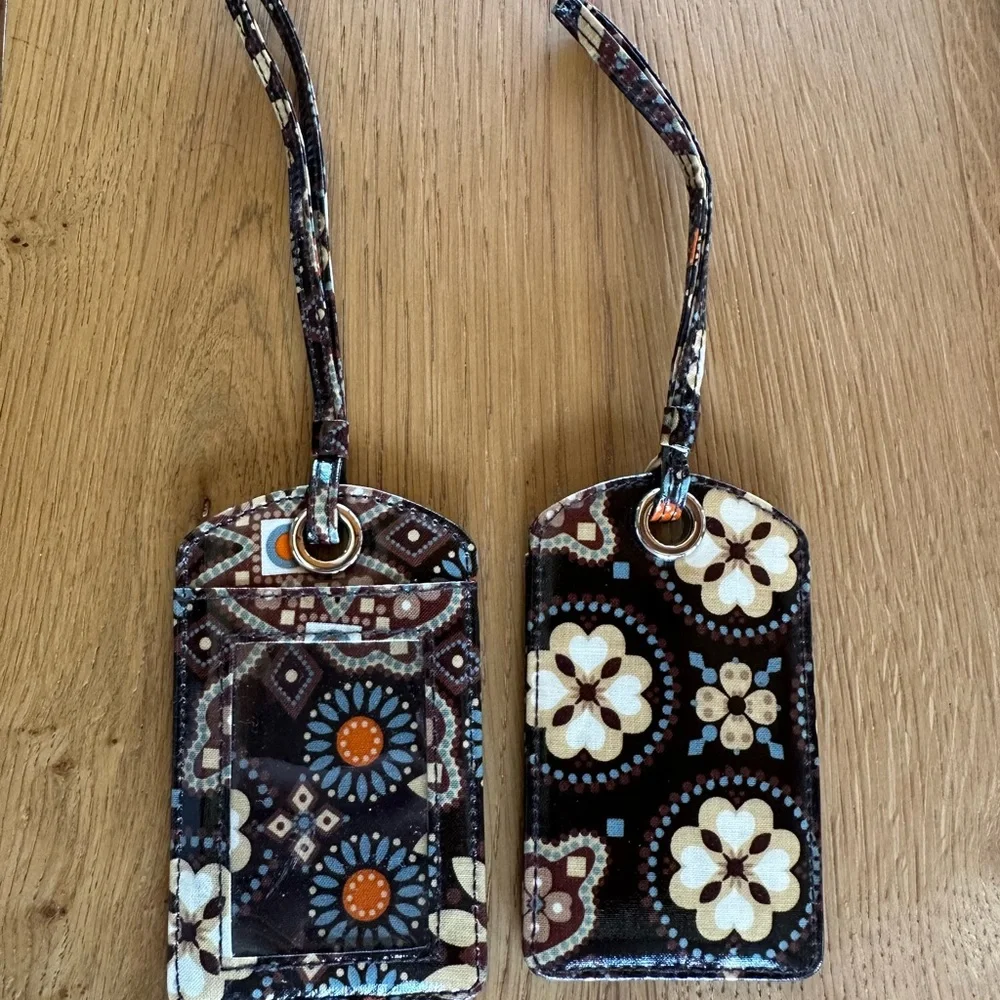 Vera Bradley luggage tags.